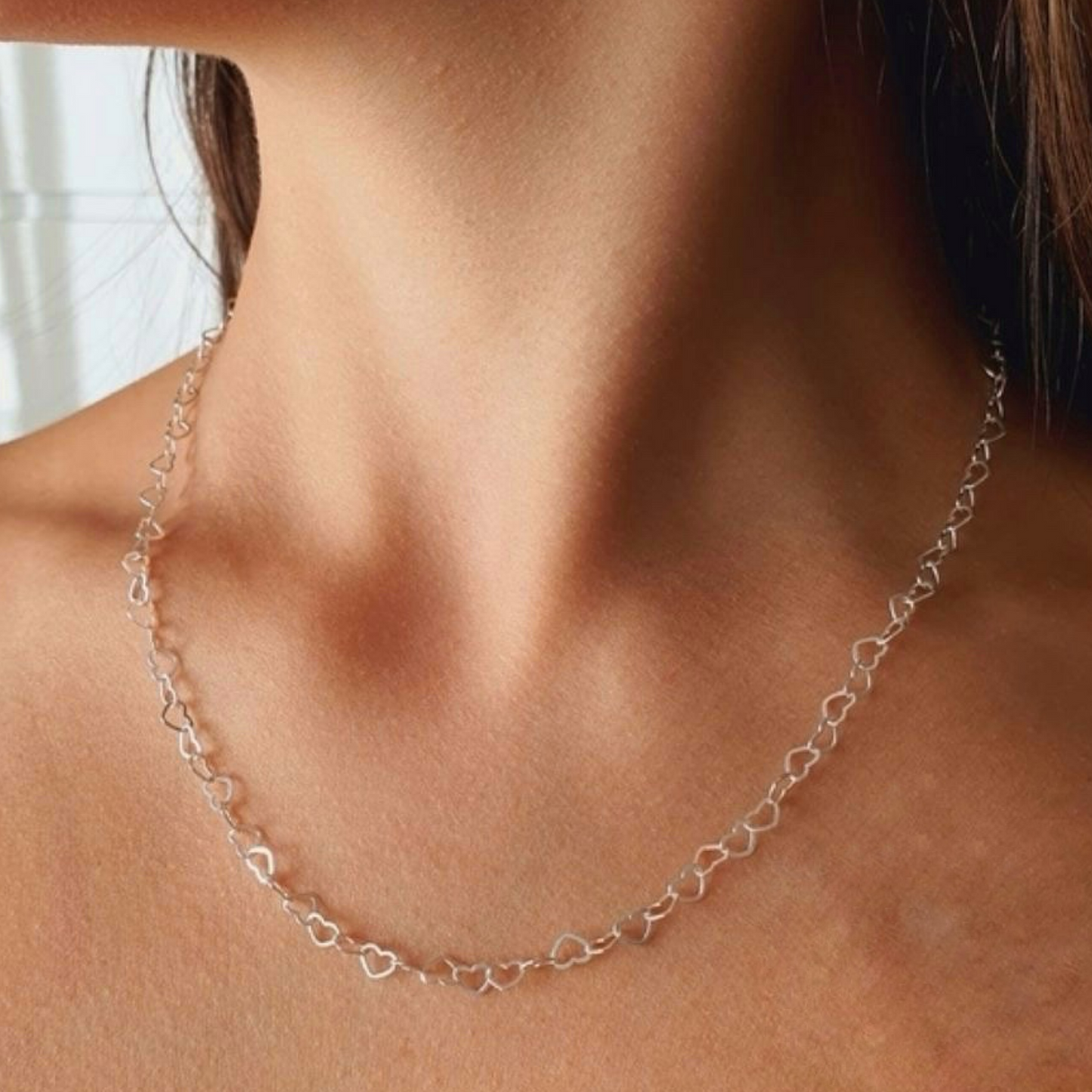 CONNECTED HEARTS NECKLACE